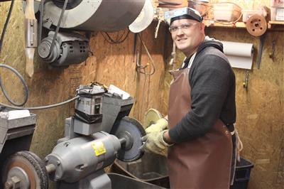 Hunter buffing guns in the buff room.